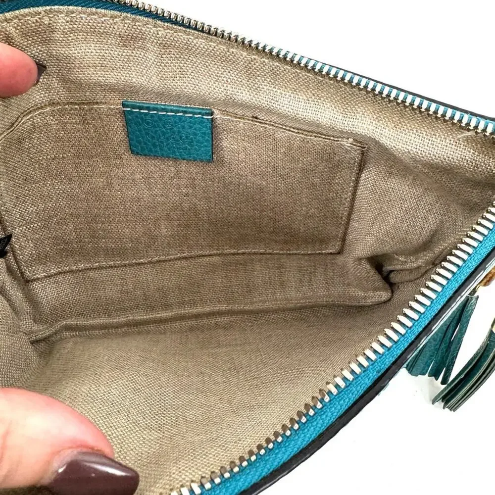 Women’s Gucci teal second bag pouch with bamboo tassels zip top closure amazing